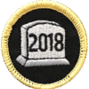 High-quality 2018 haunted attraction badge with embroidered design and gold border.