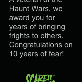 Merit badge award for 10 years of service at a haunted house attraction