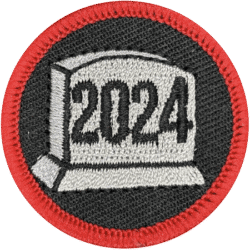 Embroidered badge featuring "2024" in bold numbers, black and white design, red border.