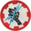 Shocking haunted attraction badge with lightning bolt and bold text, team-building pin.