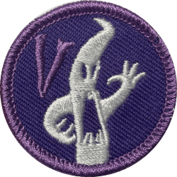 Haunted attraction badge with ghost design, perfect for team-building events.